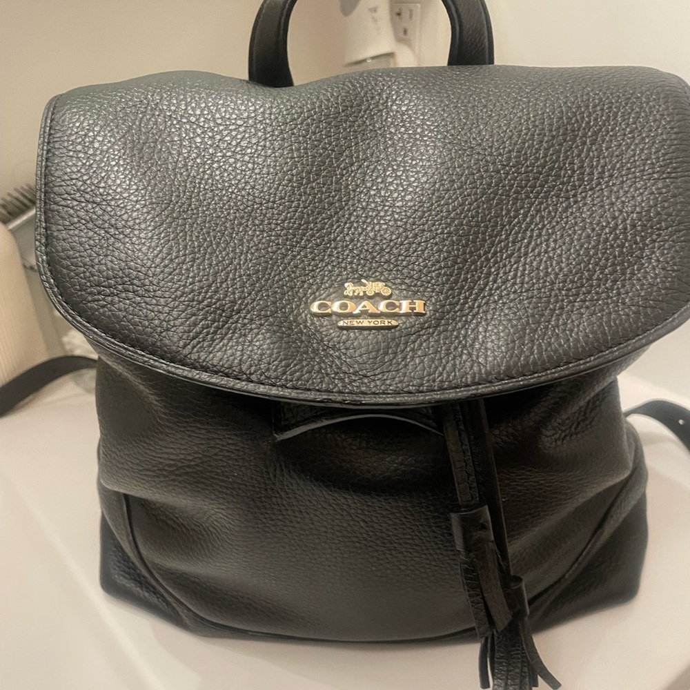 Black coach purse/back pack pretty roomy